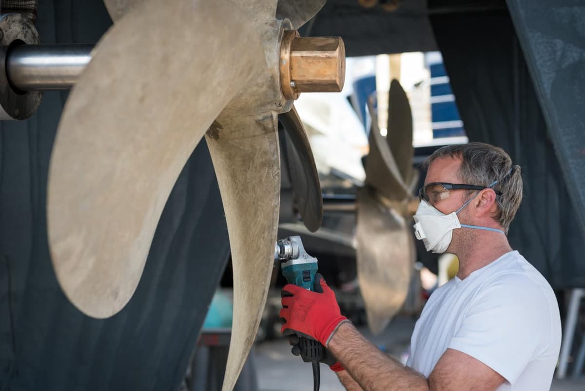 Marine professional working on a boat - Join Boatwork Pro